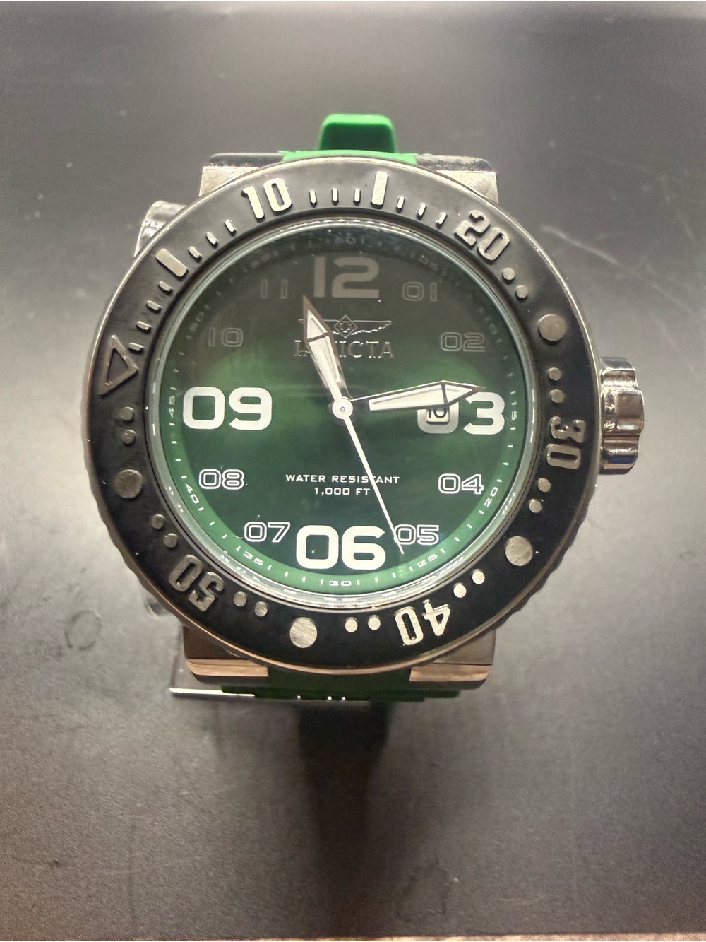 Invicta Pro Diver watch features a bold green dial And Band New Battery